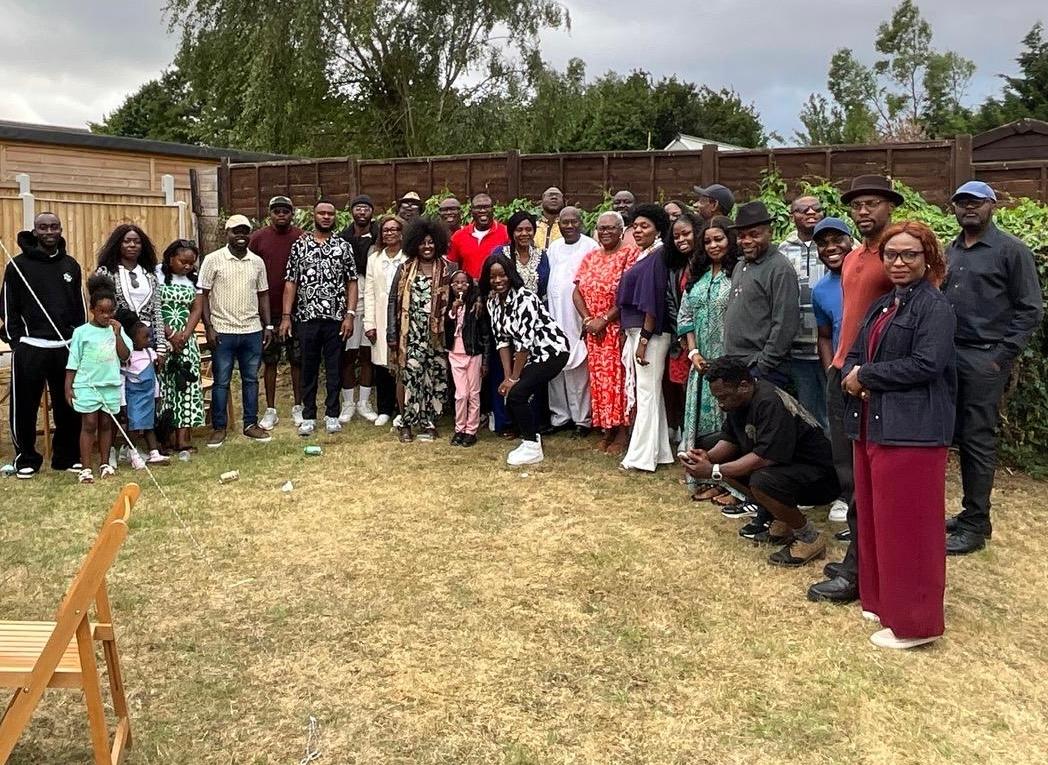 Group photograph of Ogbia Community UK members and families at the 2026 summer barbecue